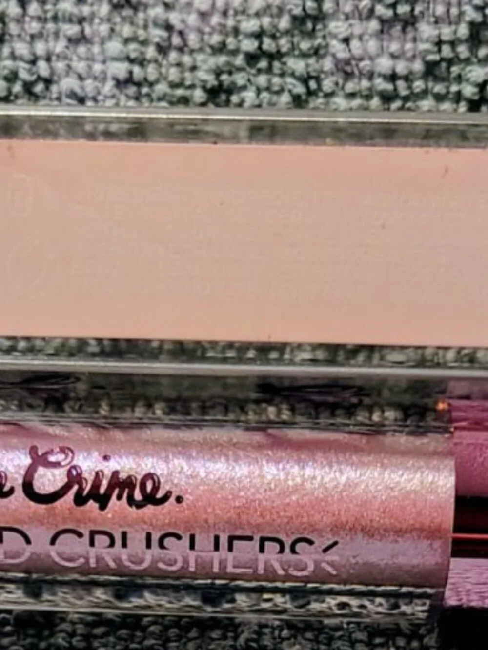 The Lime Crime Diamond Crushers Iridescent Lip Topper in the shade Choke